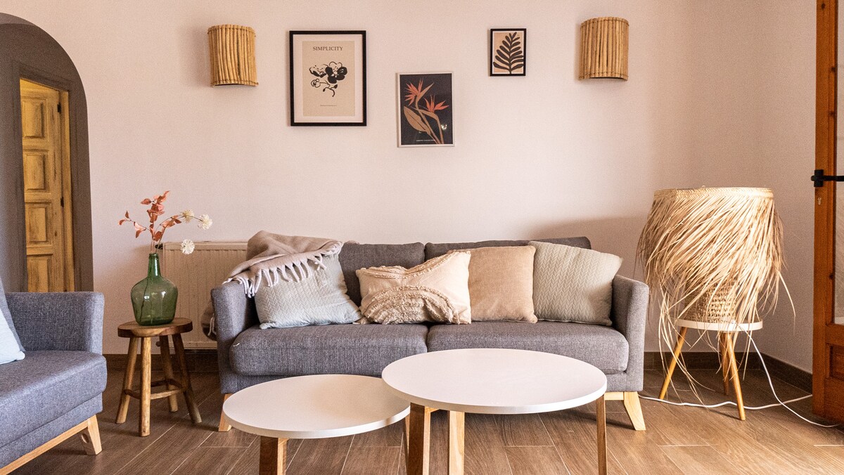 Living room with sofa and tiled floor