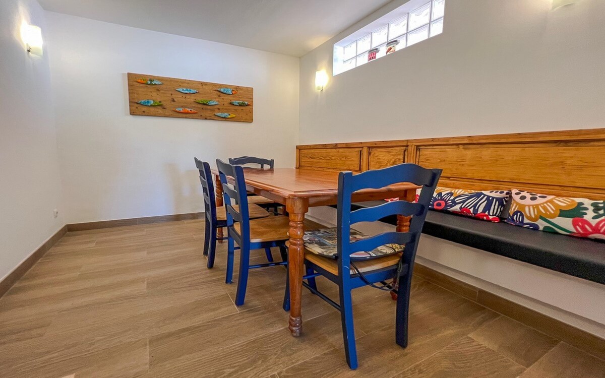 Dining area with table and pendant light